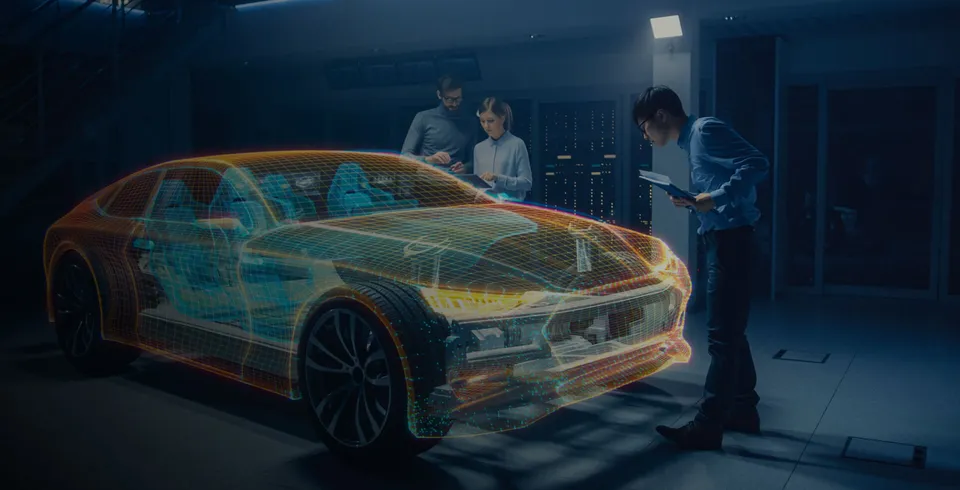 Engineers studying a car shown as a glowing see-through model of its frame and body structure.